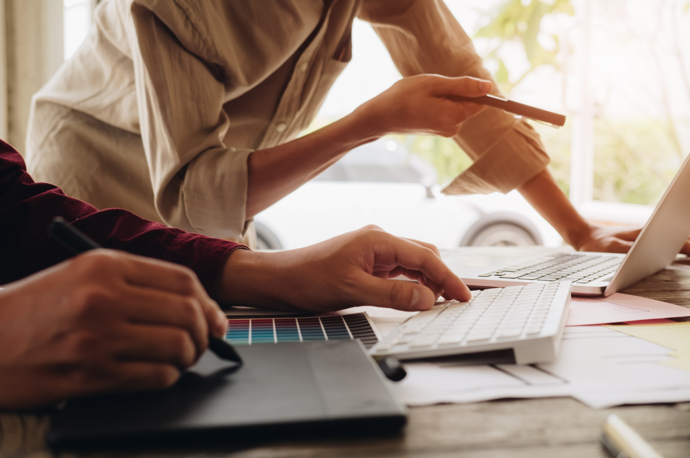 office people working on top of papers