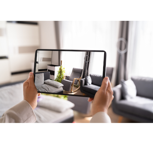 A person holding a tablet in a hotel room